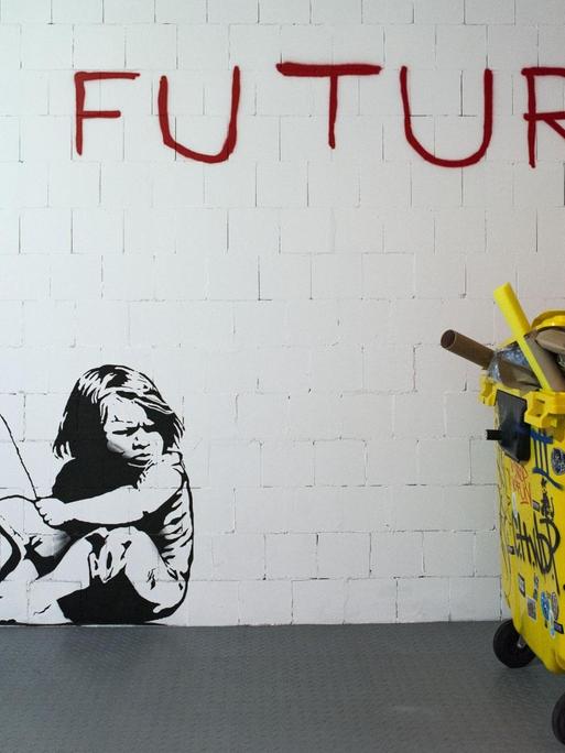 Das Graffiti "No Future" von Banksy zeigt ein Mädchen mit einem Ballon in der Hand, der der "O" in den Worten "No Future" bildet.
